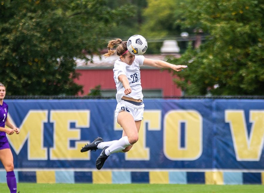 First-year forward Maggie Starker scores off the header in Marquette's 3-0 win over the University of St. Thomas Sept. 12. 