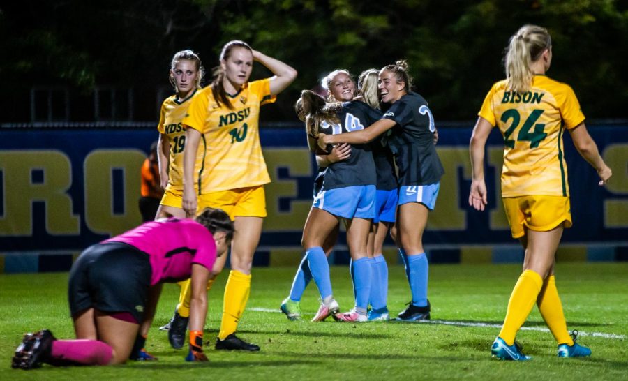 Marquette womens soccer celebrates after first-year forward Kate Gibsons game winning goal in the 106th minute against North Dakota State University Sept. 17. 
