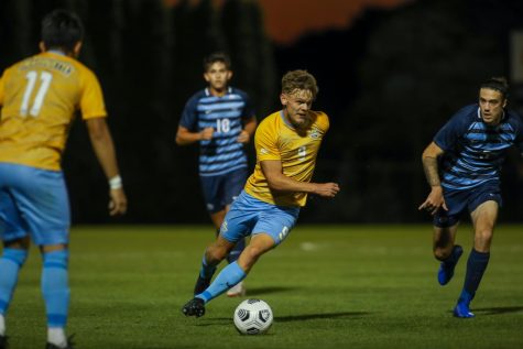 Redshirt junior forward Lukas Sunesson moves the ball up the field in Marquettes 1-0 loss to Villanova Sept. 18 at Valley Fields. (Photo courtesy of Marquette Athletics.) 