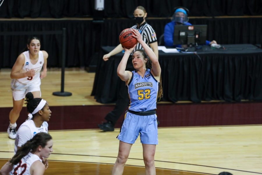 Redshirt junior forward Chloe Marotta (52) attempts a shot in Marquettes 70-63 loss to Virginia Tech March 21 in the First Round of the NCAA Tournament. (Photo courtesy of Marquette Athletics.) 