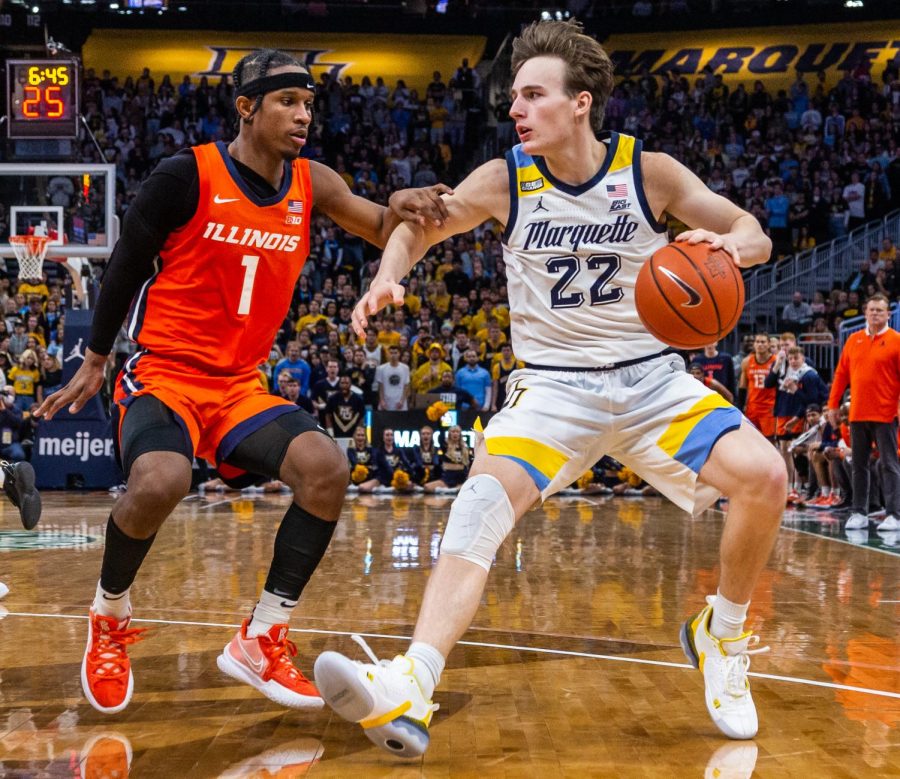 Redshirt first-year guard Tyler Kolek (22) finished with 12 points, five assists and five rebounds in Marquette mens basketballs 67-66 win over No.10 Illinois Nov. 15. 