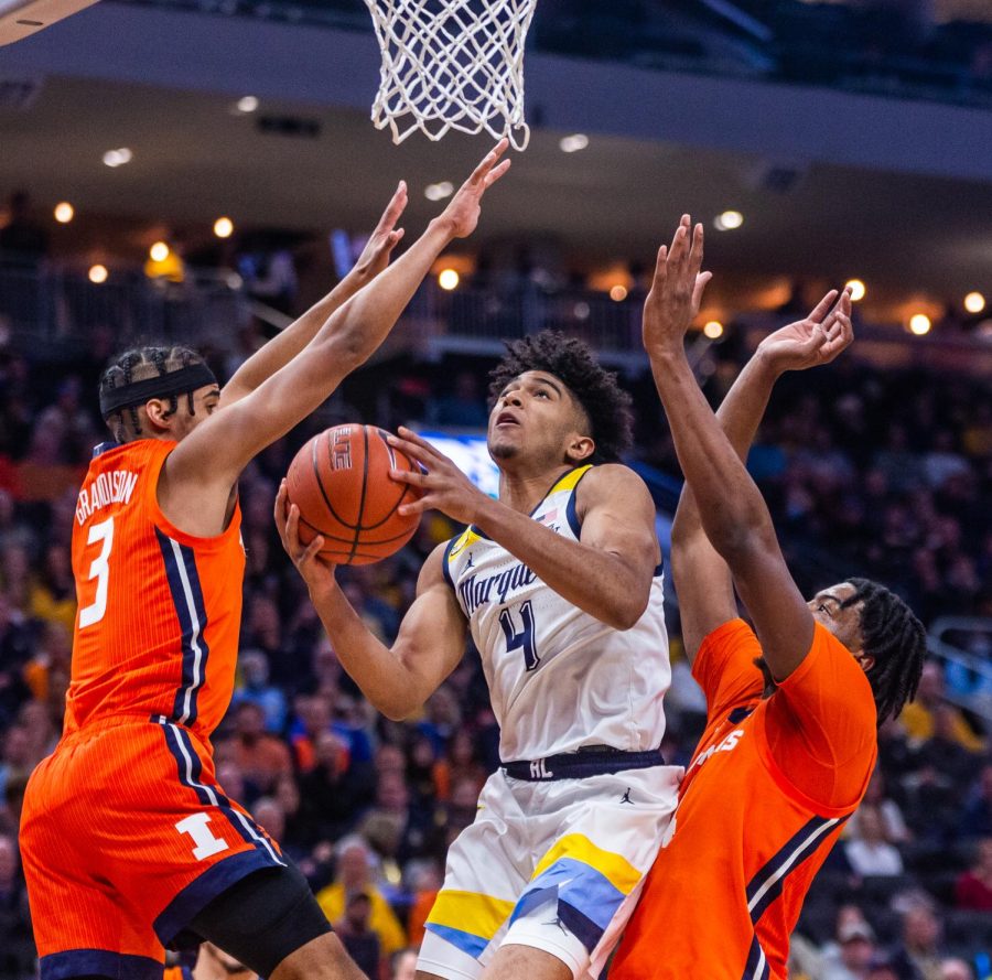 First-year guard Stevie Mitchell goes up for a basket in Marquette mens basketballs 67-66 win over No. 10 Illinois Nov. 15. 