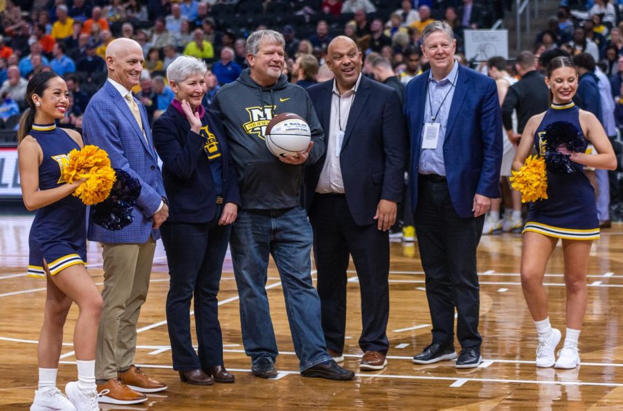 Director of Student Media Mark Zoromski is honored during Marquette mens basketball 67-66 win over No. 10 Illinois Nov. 15. 