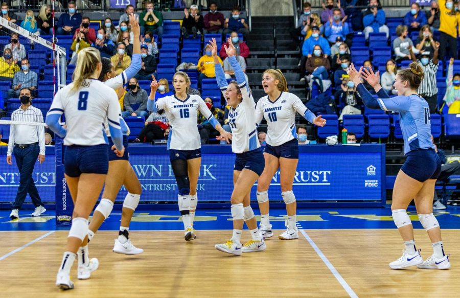 Marquette’s seven celebrate after a kill by graduate student Savannah Rennie (16). The Golden Eagles lost to the Bluejays 3-1 on October 29, 2021 at the Al McGuire Center (COLLIN NAWROCKI/Marquette Wire)