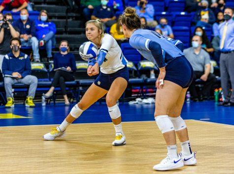 Graduate student outside hitter Hope Werch attempts a pass in Marquettes 1-3 loss to Creighton Oct. 29.