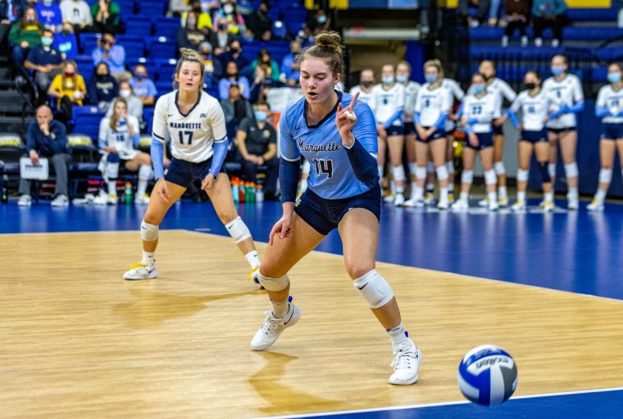 Redshirt Sophomore Carly Skrabak (14) motions signifying that the ball is going out. The Golden Eagles lost to the Bluejays 3-1 on October 29, 2021 at the Al McGuire Center (COLLIN NAWROCKI/Marquette Wire)