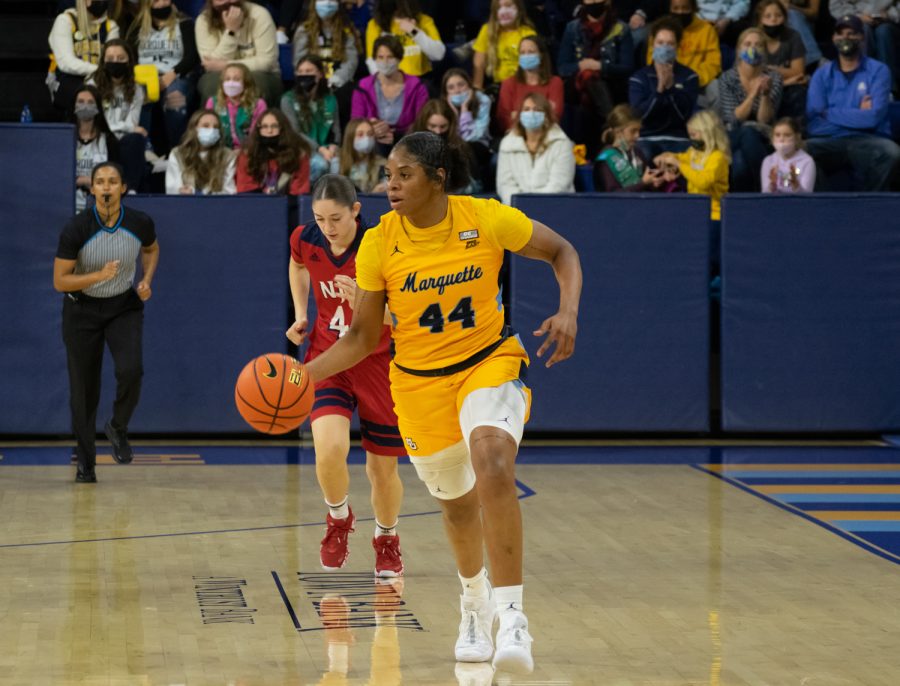 Redshirt sophomore forward Kennedi Myles dribbles in the ball in Marquette womens basketballs 90-58 win over NJIT Nov. 12. 