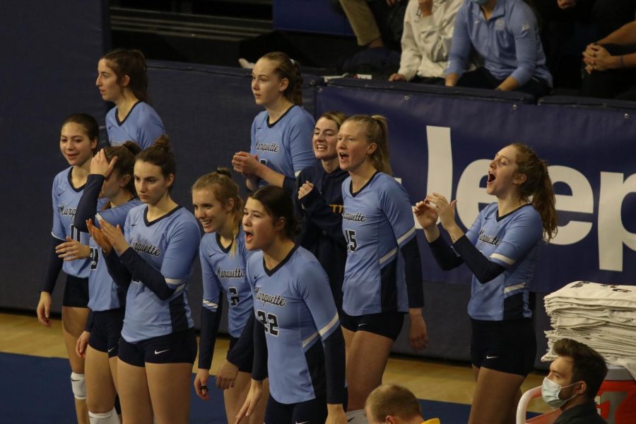 Marquette volleyball members cheer from the bench in its 0-3 loss to Creighton in the BIG EAST Championship game Nov. 27. 