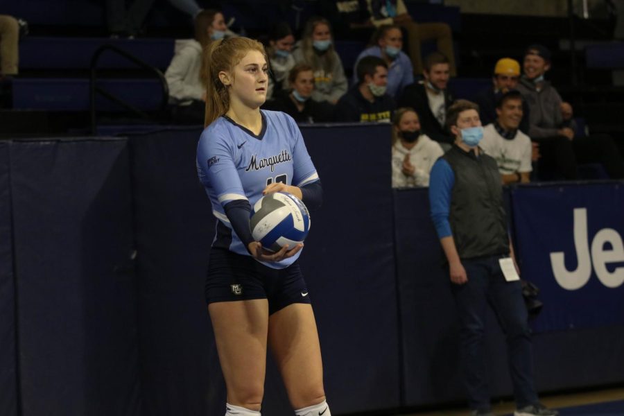 Taylor Wolf (10) gets ready to attempt a serve in Marquette volleyballs 0-3 loss to Creighton in the BIG EAST Championship game Nov. 27. 