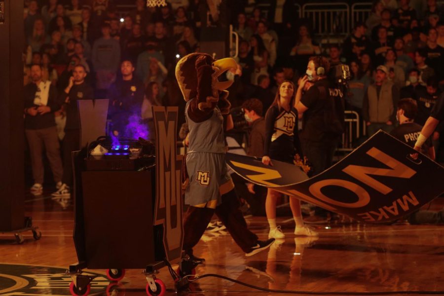 Iggy The Golden Eagle getting the crowd loud during Marquette mens baskeballs starting lineup introduction Nov. 27. 