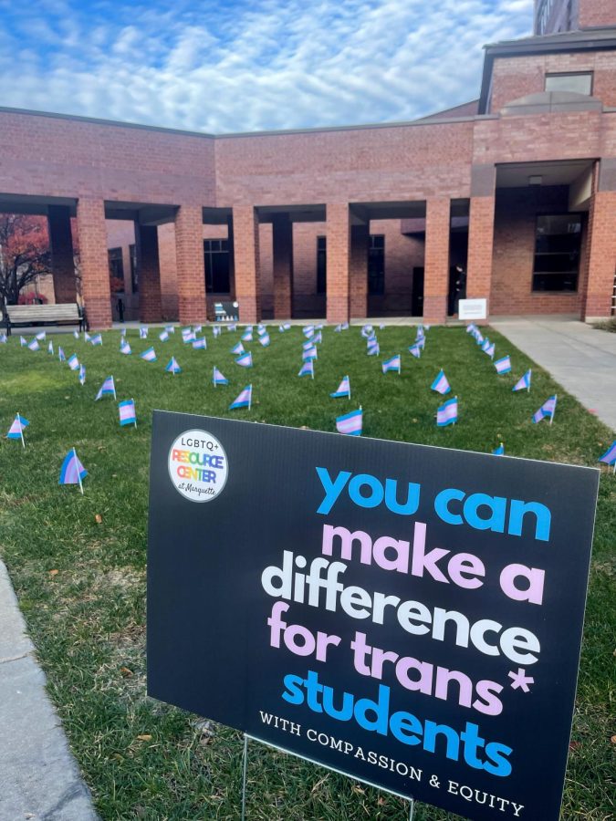 Transgender+flags+adorned+the+grass+outside+the+Alumni+Memorial+Union.