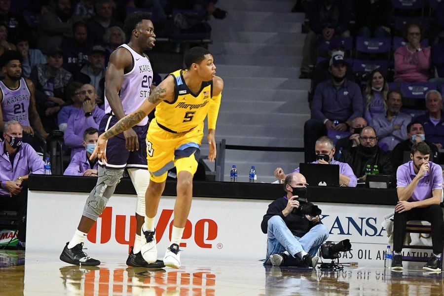 Redshirt+junior+guard+Greg+Elliott+finished+with+eight+points+of+the+bench+in+Marquette+mens+basketballs+64-63+win+over+Kansas+Dec.+8.+%28Photo+courtesy+of+Marquette+Athletics.%29
