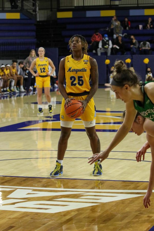 Sophomore guard Danyel Middleton (25) at the free-throw line during Marquette womens basketballs 89-65 win over North Dakota Dec. 11. 