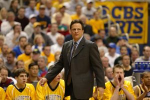 Former Marquette mens basketball head coach Tom Crean walking the sidelines in the Marquettes NCAA Tournament Elite 8 game vs Kentucky in 2003. (Photo courtesy of Marquette Athletics.)