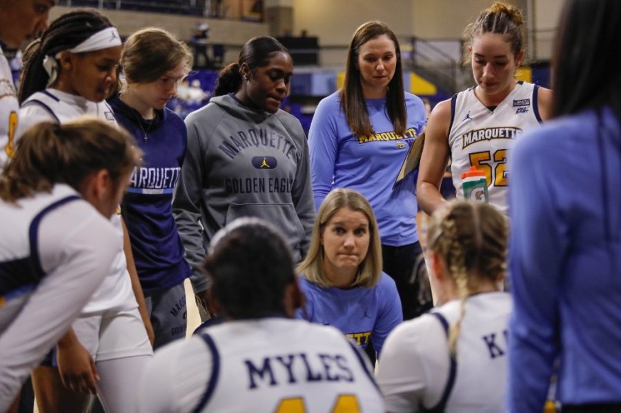 Womens basketball head coach Megan Duffy talks to her to team in a timeout during its 59-45 win over Butler Dec. 5. (Photo courtesy of Marquette Athletics.)