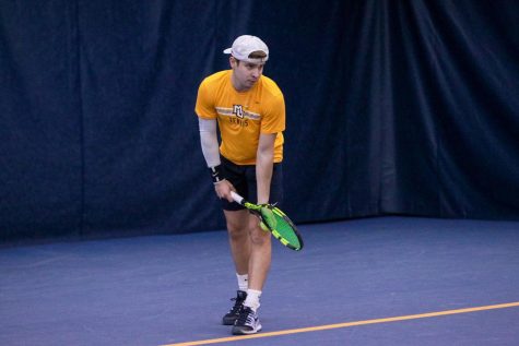 Pablo Dale gets ready to serve the ball. (Photo courtesy of Marquette Athletics.)