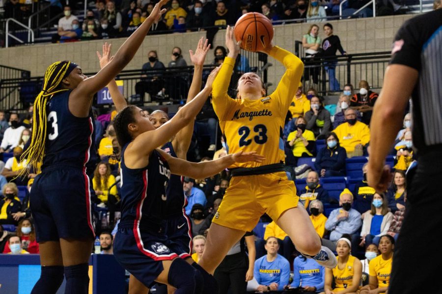 Junior guard Jordan King (23) goes up for a layup in Marquette womens basketballs loss to UConn Feb. 13. 