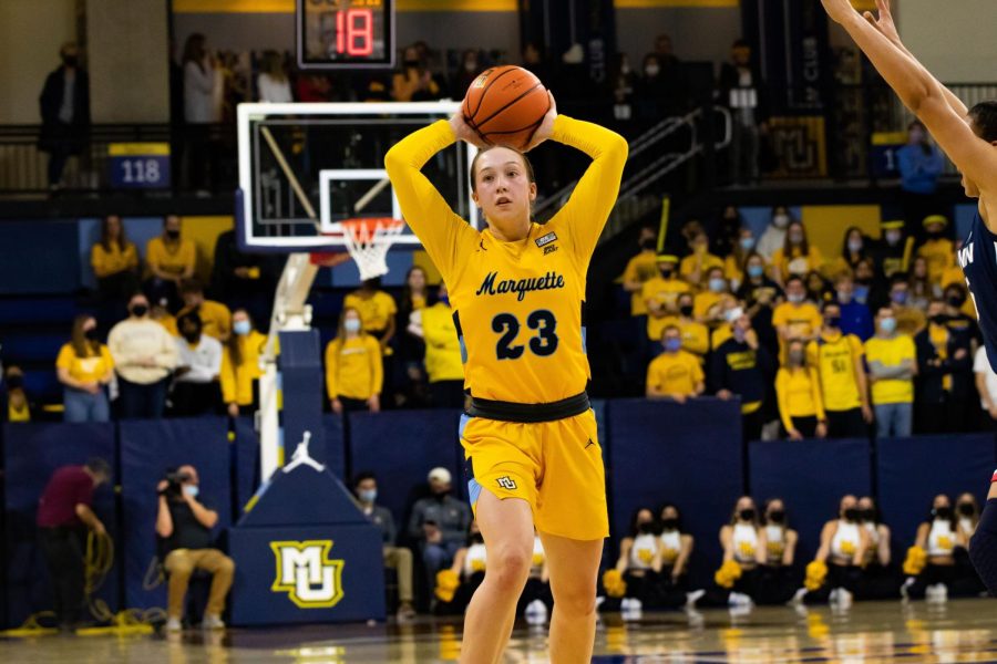 Junior guard Jordan King (23) looks to make a pass in Marquette womens basketballs 72-58 loss to UConn Feb. 13. 