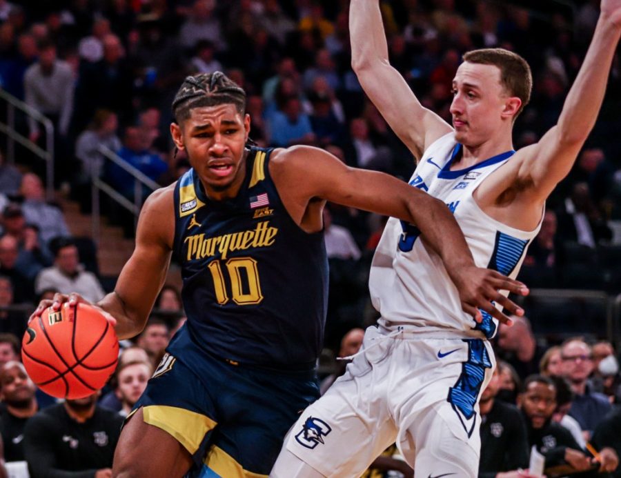 Redshirt+first-year+forward+Justin+Lewis+%2810%29+heads+to+the+basket+in+Marquette+mens+basketballs+74-63+loss+to+Creighton+in+the+BIG+EAST+Tournament+Quarterfinals+March+10+at+Madison+Square+Garden.+%28Photo+courtesy+of+Marquette+Athletics.%29