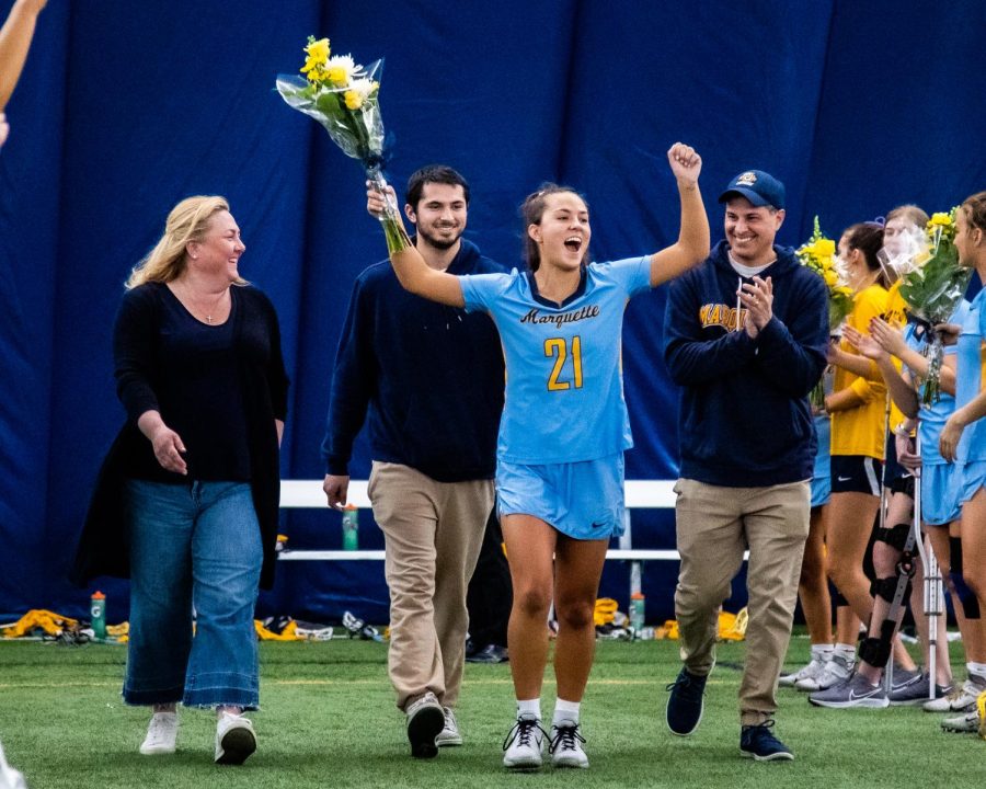 Shea and Nolan Garcia with their parents at Marquette womens lacrosses senior day April 24. 