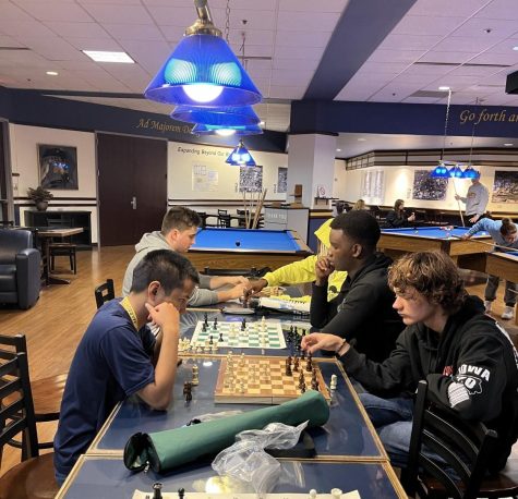 The Marquette Chess Club practicing inside the Brooks Lounge at the Alumni Memorial Union. 