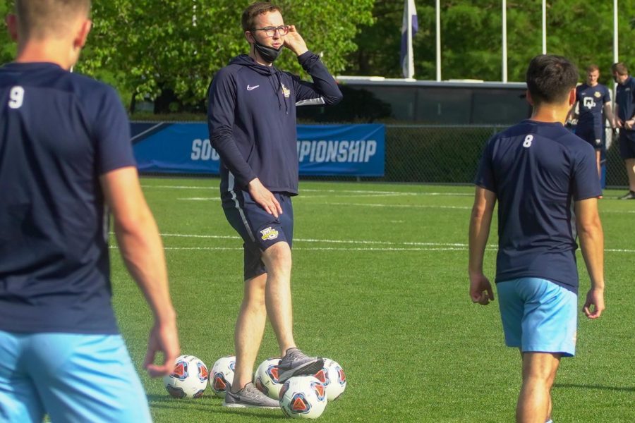Danny Jarosz (center) at a Marquette mens soccer practice ahead of a match in the 2020 NCAA Tournament. (Photo courtesy of Marquette Athletics.)