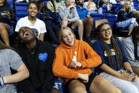 Members of the Marquette womens basketball team at a Marquette volleyball game earlier this season. (Photo courtesy of Marquette Athletics.)