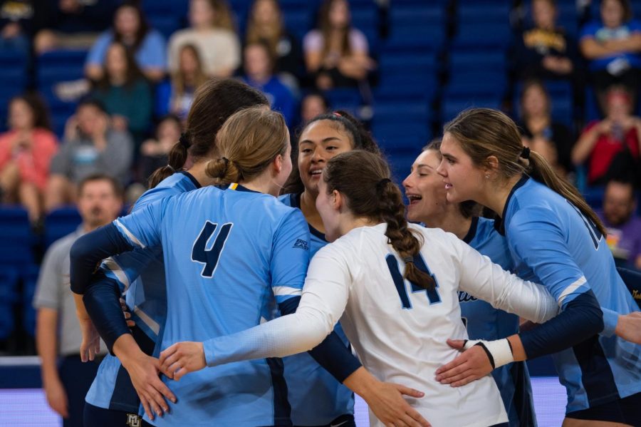 Marquette volleyball celebrates in its 3-0 win over DePaul Sept. 21 at the Al McGuire Center. 