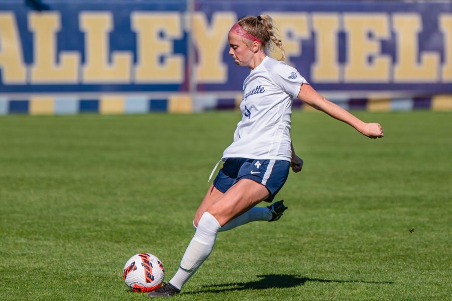 Bonnie Lacey (4) sets up for a kick in Marquette womens soccers 2-1 loss to UConn Oct. 2. 