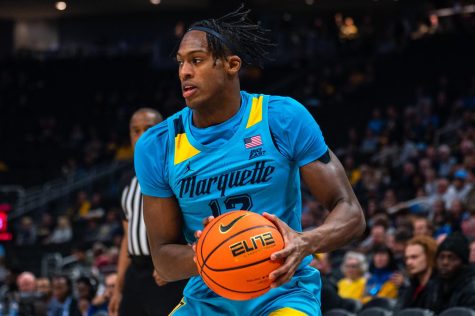 Junior forward Olivier-Maxence Prosper (12) finished with a career-high 31 points in Marquette mens basketballs 95-58 win over Long Island University Nov. 17 at Fiserv Forum. 