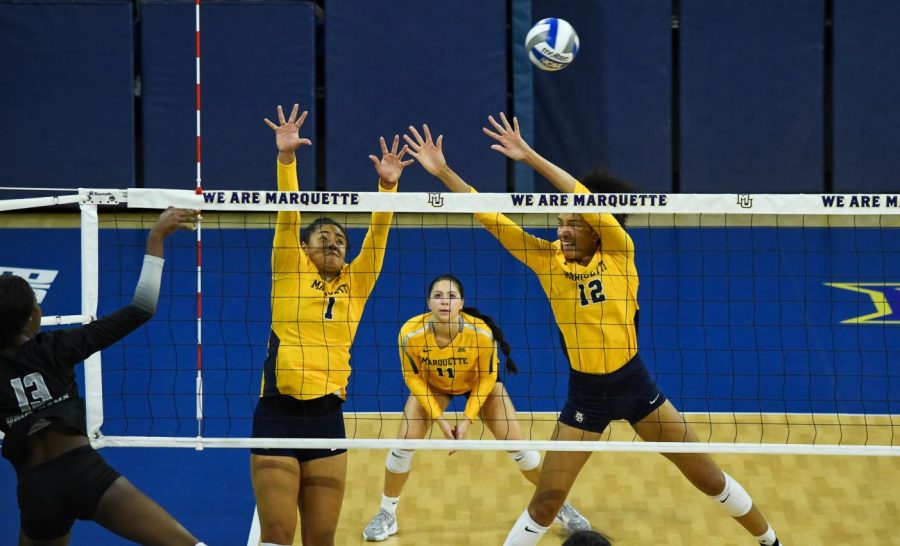 Yadira Anchante (1) and Carsen Murray (12) go up for a block attempt in No. 17 Marquette volleyballs 3-0 win over Georgetown Nov. 4 at the Al McGuire Center. 