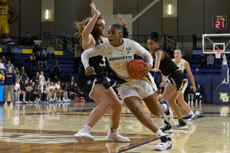 Kennedi Myles (44) driving to the basket in Marquette womens basketballs 75-55 win over Holy Cross Nov. 11. 