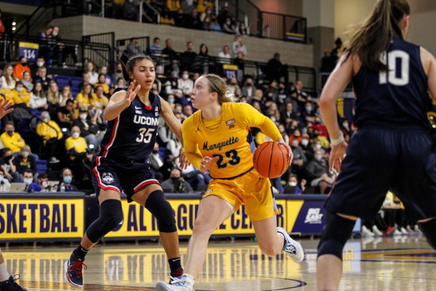 Senior guard Jordan King driving to the basket in Marquette womens basketballs game against UConn Feb. 13 2022 at the Al McGuire Center. (Photo courtesy of Marquette Athletics.)