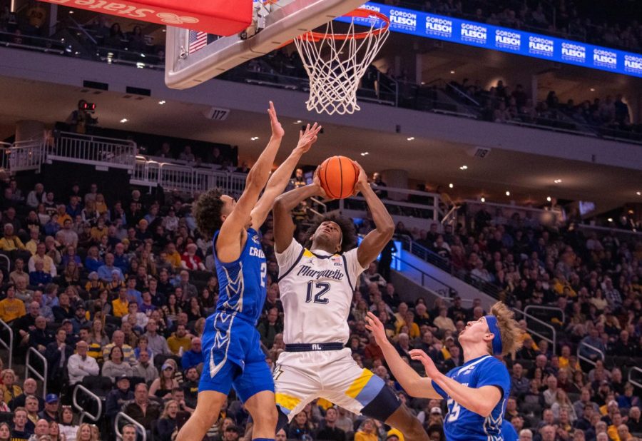 Junior forward Olivier-Maxence Prosper goes up for a shot in Marquette mens basketballs win over Creighton Dec. 16 at Fiserv Forum. 