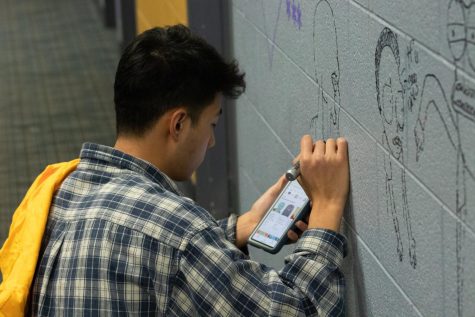Students were able to draw on the walls of the Rec Center during the event. 
