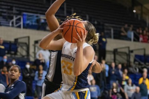 Senior guard Jordan King goes up for a layup in Marquette womens basketballs 64-40 win over Xavier Jan. 25 at the Al McGuire Center. 