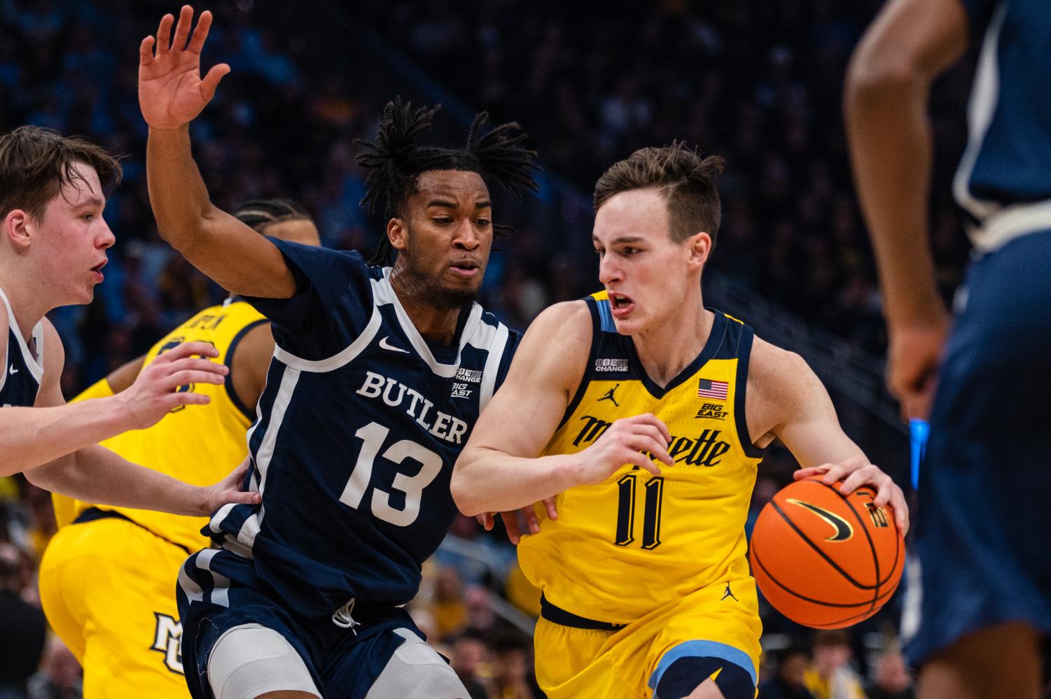 No. 14 Marquette pulls past Butler on National Marquette Day ...