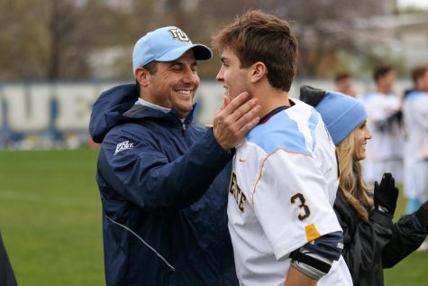 Joe Amplo (left) was first Marquette mens lacrosse head coach from 2010-19.  (Photo courtesy of Marquette Athletics.)
