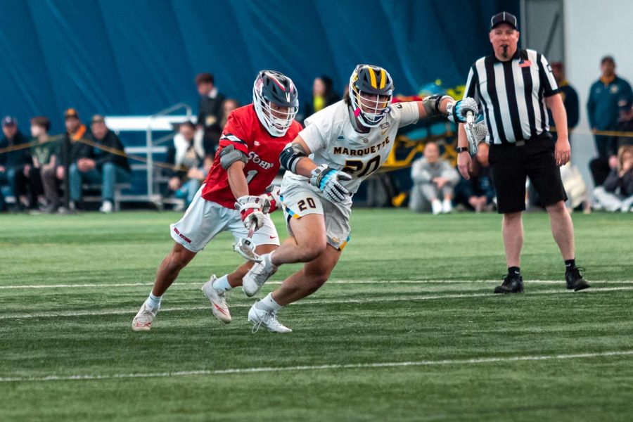 Emmanuel ranks second amongst all Marquettes faceoff specialists in faceoff win percentage this season. (Photo courtesy of Marquette Athletics.)