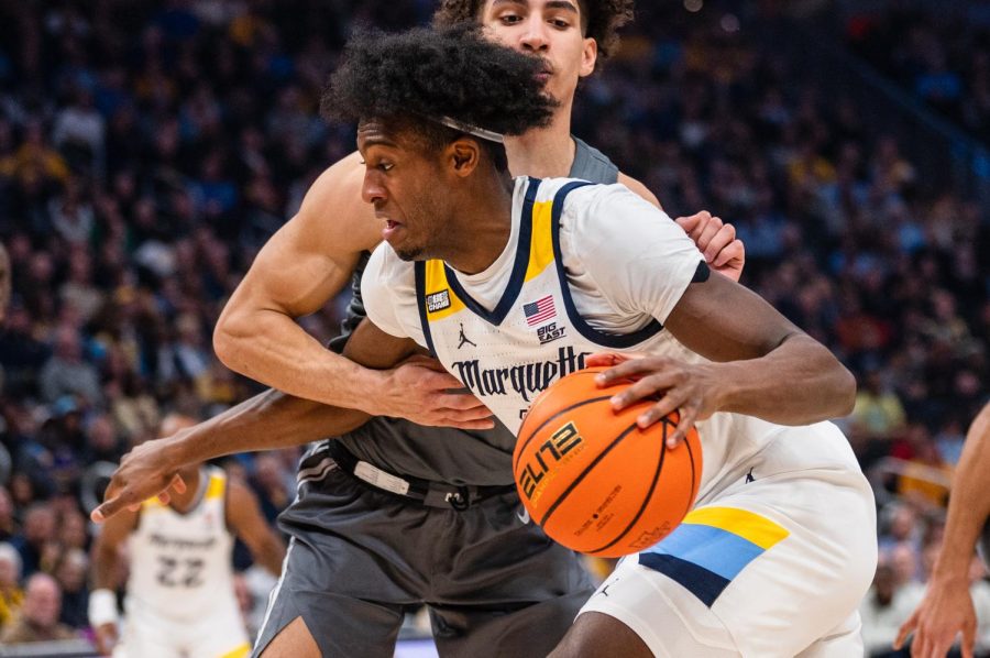 Junior forward Olivier-Maxence Prosper drives to the basket in Marquettes win over Xavier Feb. 15 at Fiserv Forum. (Marquette Wire Stock Photo)