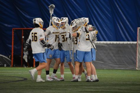 Marquette mens lacrosse celebrates after a goal in its win over St. Bonaventure March 25 at Valley Fields. 