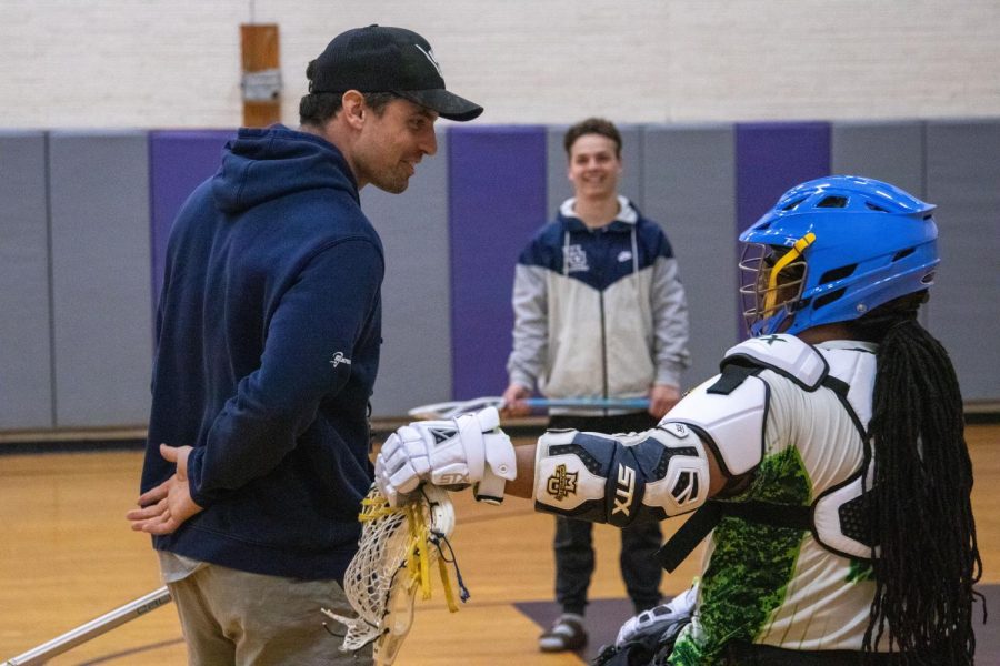 Marquette mens lacrosse assistant coach Jake Richard (left) is the head coach of the Milwaukee Eagles Wheelchair Lacrosse team. 