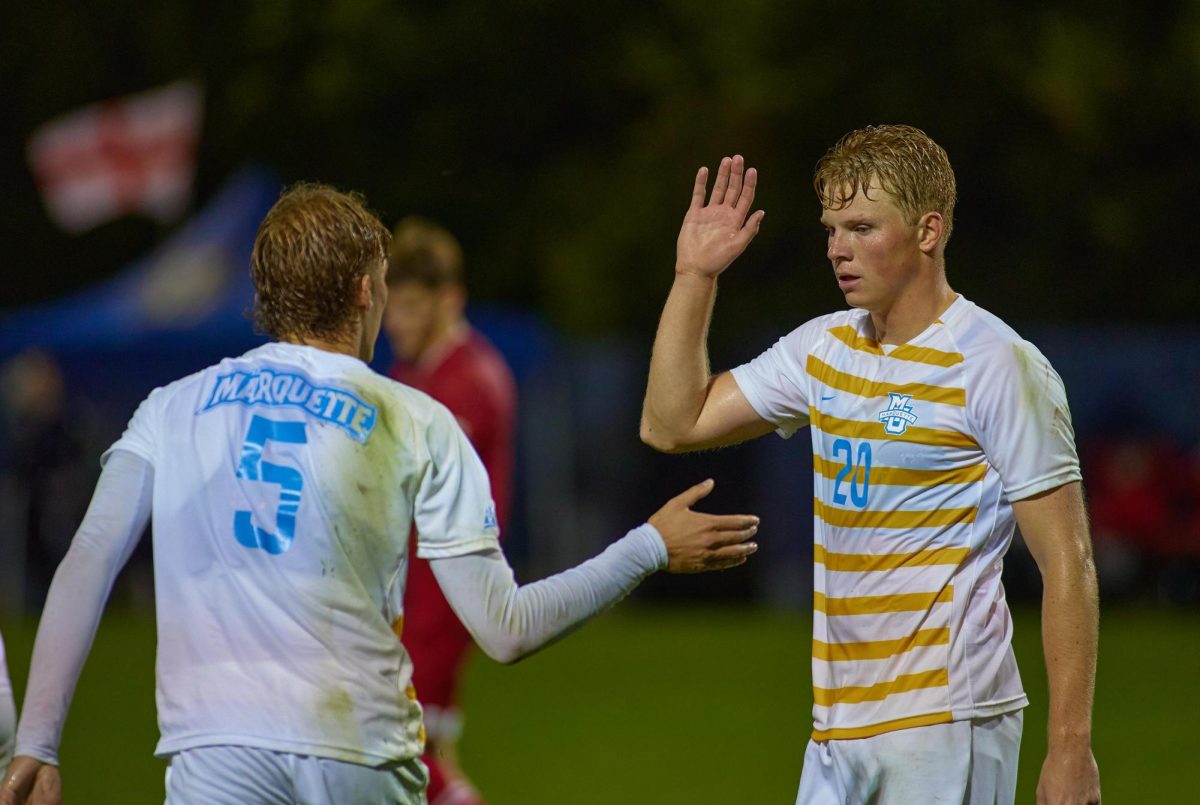 Jonas Moen (20) and Tristan Ronnestad-Stevens (5) have helped Marquette become the No. 3 Big East team in average goals against. (Photo courtesy of Marquette Athletics.)