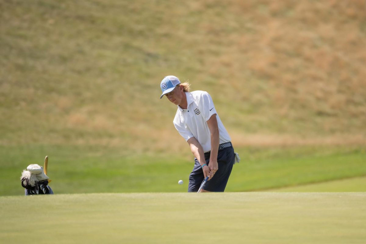 Junior Patrick Adler is one of many Marquette golfers that caddy over the summer. (Photo courtesy of Marquette Athletics.)