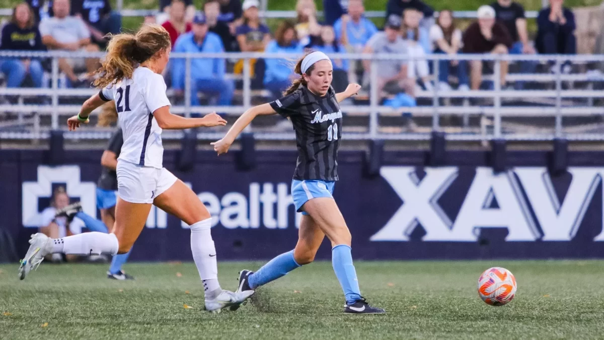 Junior+midfielder+Julia+ONeill+%2811%29+dribbles+ball+in+Marquette+womens+soccers+3-0+loss+to+No.+17+Xavier+Thursday+night.+%28Photo+courtesy+of+Marquette+Athletics.%29