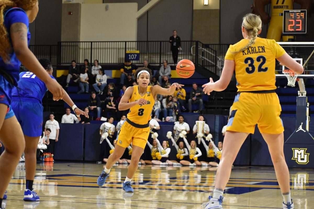 Liza Karlen and Rose Nkumu in Marquette womens basketballs 98-80 win over DePaul Feb. 27 at the Al McGuire Center.