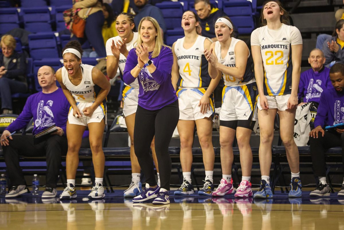 Head coach Megan Duffy became the fastest coach in Marquette womens basketball history to reach 100 wins. (Photo courtesy of Marquette Athletics.)