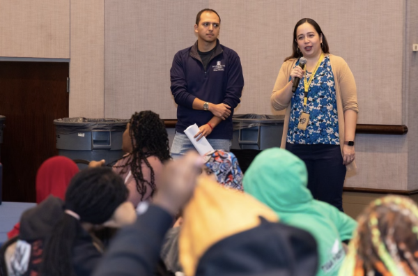 Youth Coalition Summit Fall 2022. Ventura is standing with PhD student Saul Lopez, who works with her as a research assistant.
