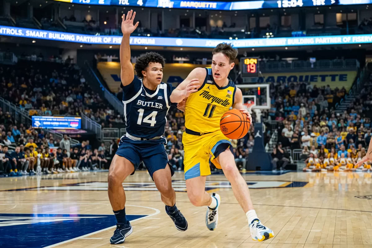 Tyler Kolek (11) drives to the hoop in No. 11 Marquettes 69-62 loss to Butler. (Photo courtesy of Marquette Athletics.)