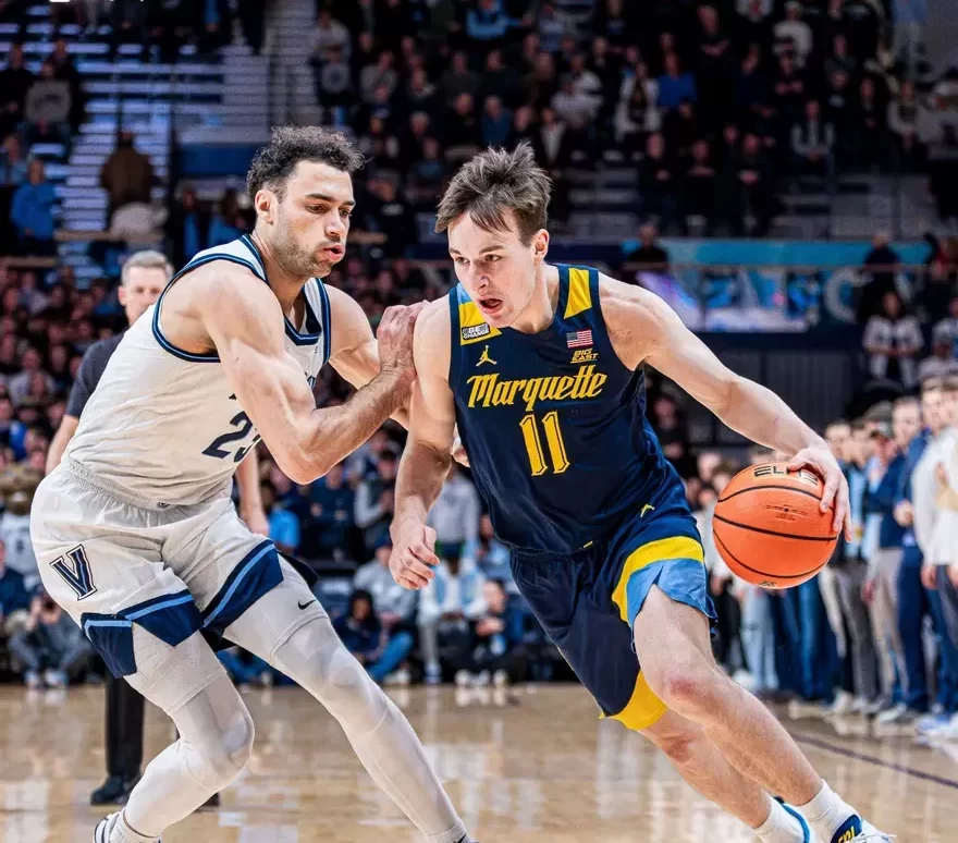 Tyler Kolek drives to the hoop in Marquettes 85-80 win over Villanova. (Photo courtesy of Marquette Athletics.)